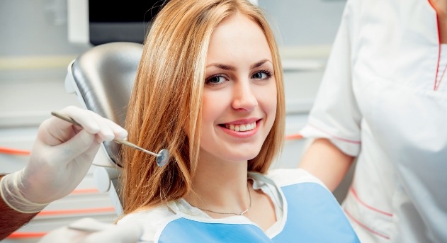 Smiling woman in dental chair