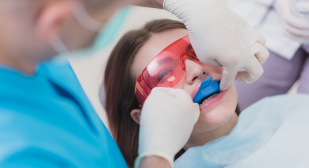 Dental patient receiving fluoride treatment