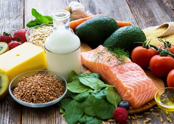 A selection of healthy food against a rustic background