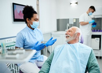 Man smiling in the dental chair