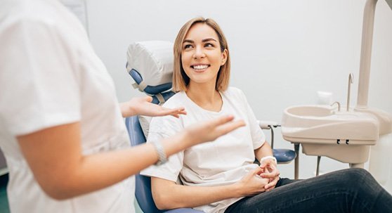 Lady smiles at dentist?