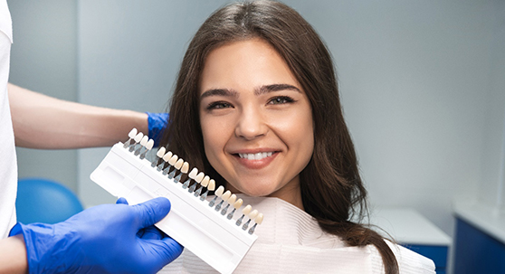 Young woman pointing to a color slide