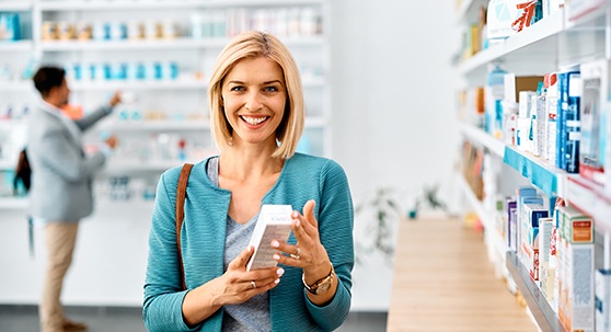 Patient in Lakewood looking at teeth whitening products
