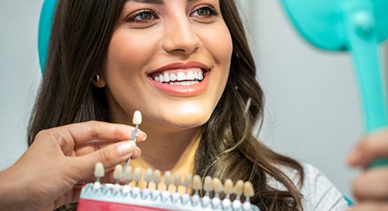 Patient in Lakewood smiling after teeth whitening
