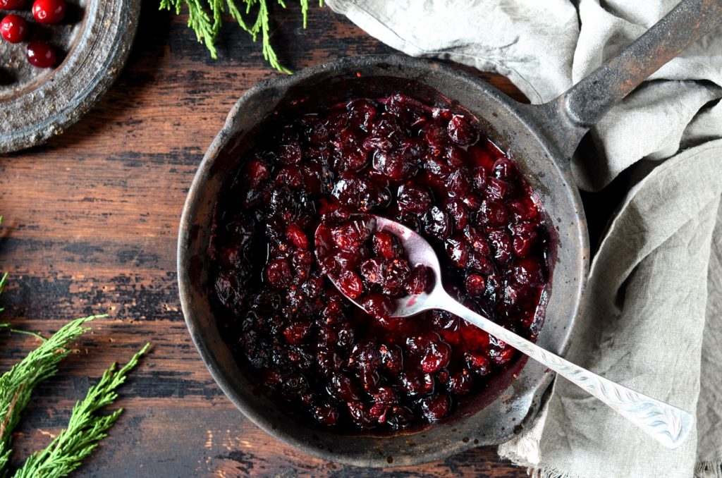 Closeup of cranberry sauce in metal serving dish